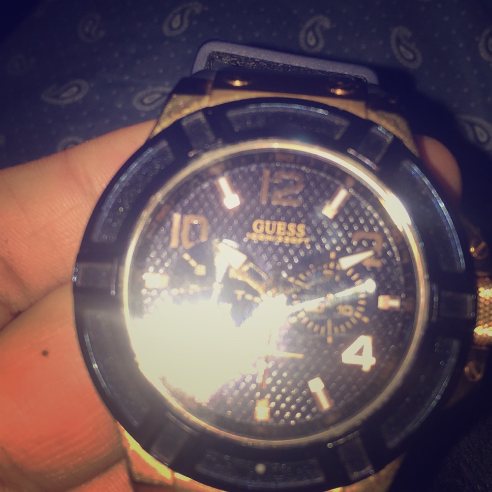 Rose gold and blue guess watch